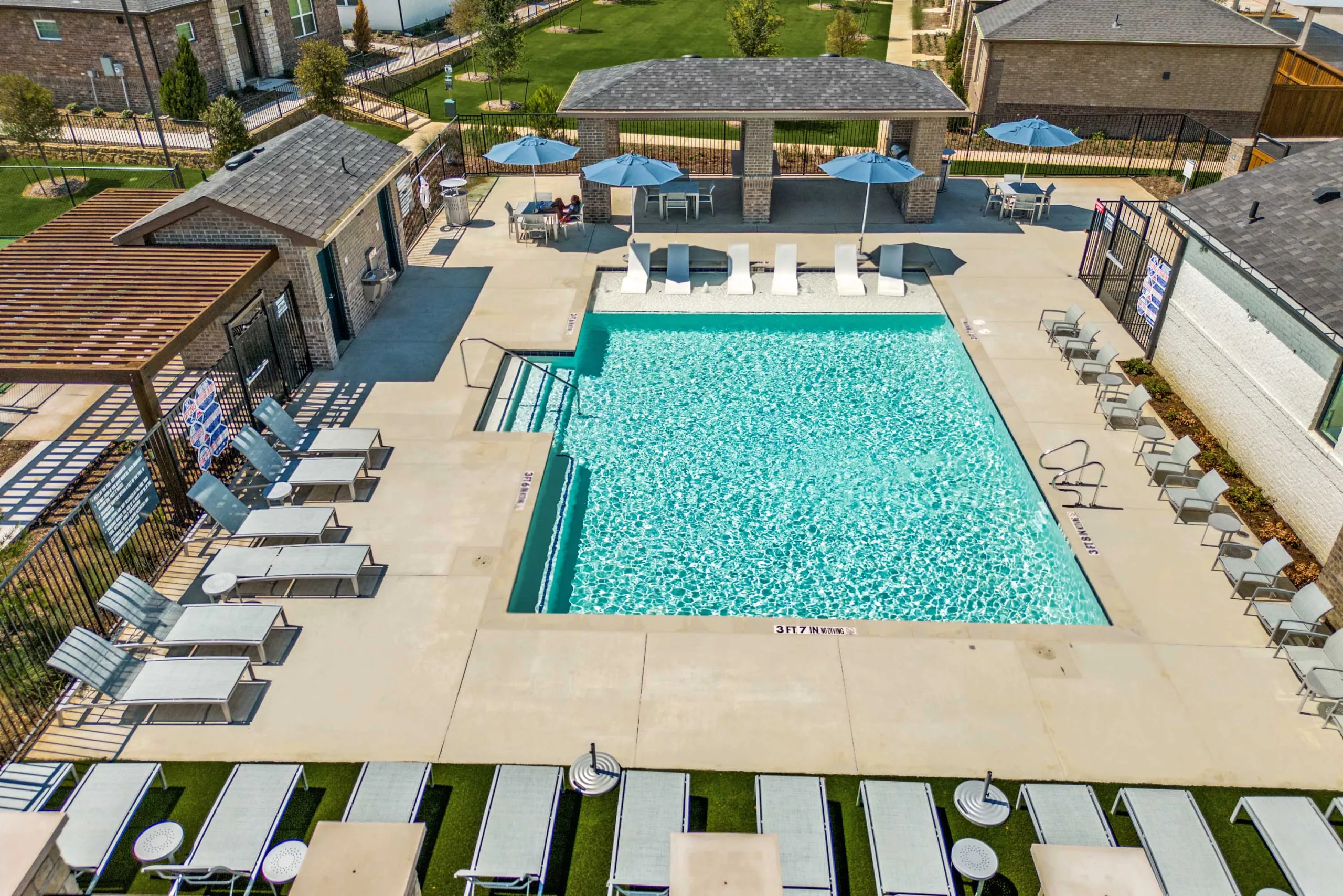 Aerial view of the pool in daylight.